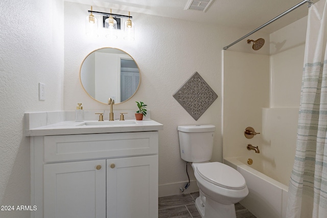 full bathroom with vanity, toilet, and shower / bath combo with shower curtain