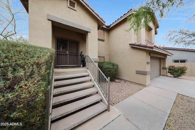 entrance to property with a garage