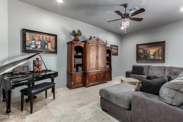 living room with ceiling fan