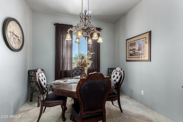 dining room featuring an inviting chandelier