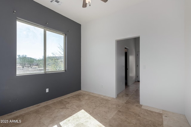 empty room with ceiling fan