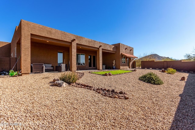 rear view of house with a patio area