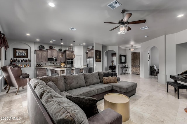 living room with ceiling fan