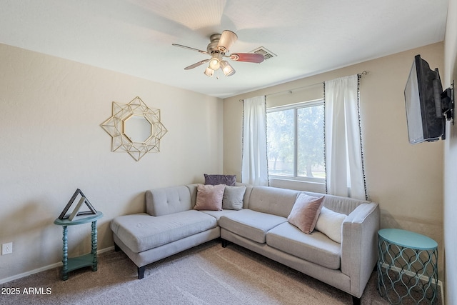 869 W Shellfish Dr, Gilbert, AZ 85233 - living room featuring carpet floors, ceiling fan, and baseboards