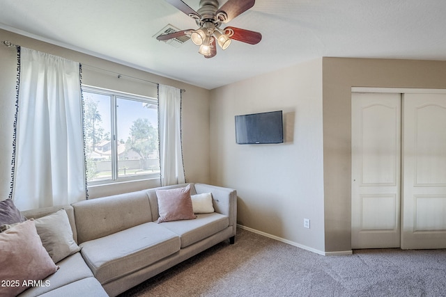 869 W Shellfish Dr, Gilbert, AZ 85233 - carpeted living room featuring ceiling fan and baseboards