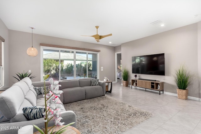 living room featuring ceiling fan