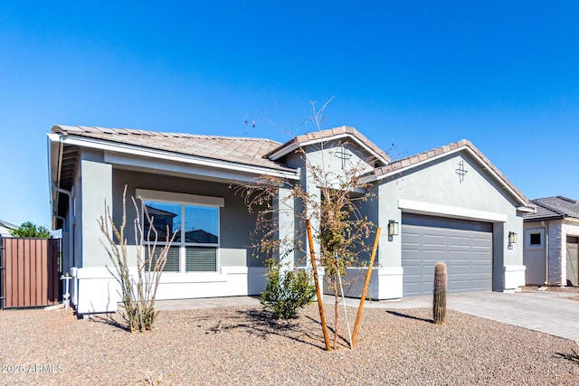 ranch-style house featuring a garage