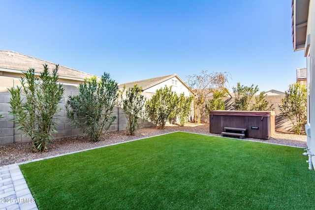 view of yard featuring a hot tub