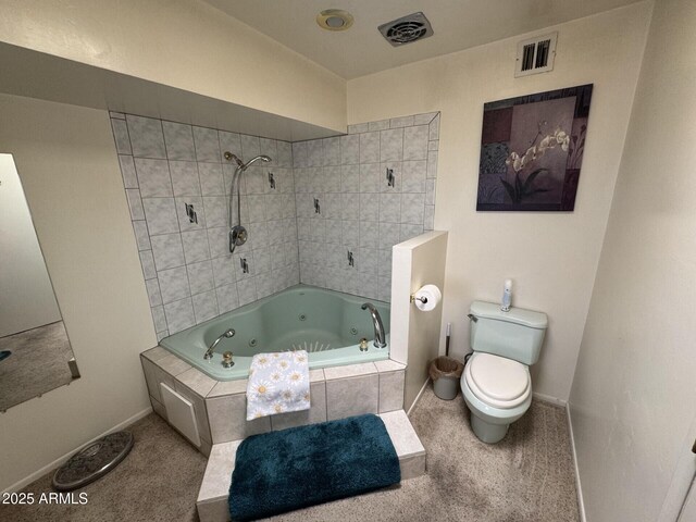 bathroom with toilet, a combined bath / shower with jetted tub, visible vents, and baseboards