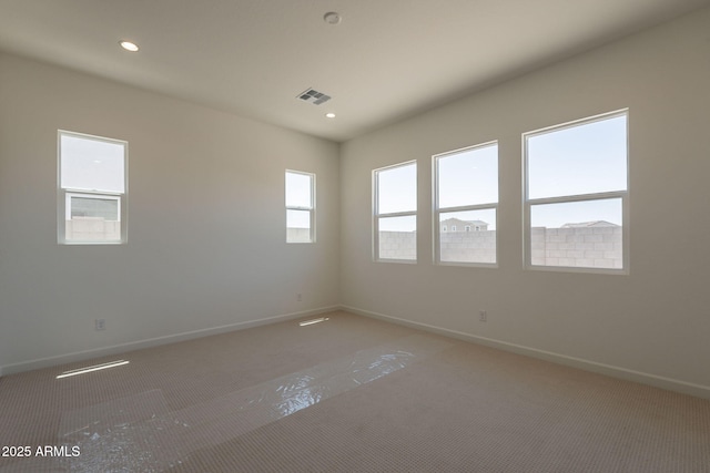 17966 W Long Lake Rd, Goodyear, AZ 85338 - unfurnished room with light carpet and recessed lighting