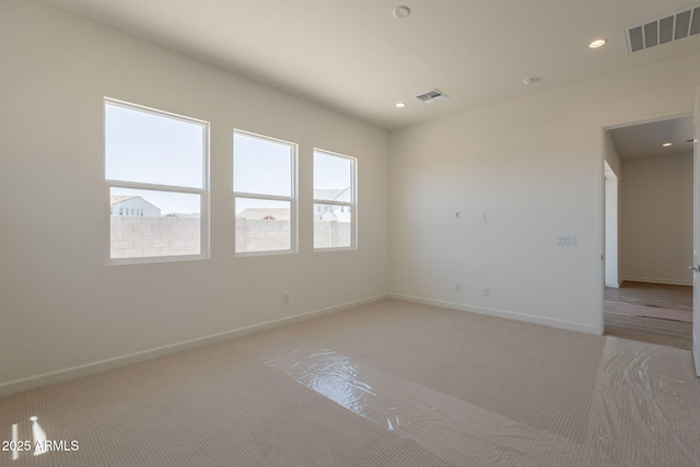 17966 W Long Lake Rd, Goodyear, AZ 85338 - empty room with light colored carpet and recessed lighting