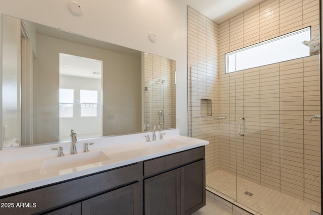 17966 W Long Lake Rd, Goodyear, AZ 85338 - full bathroom with double vanity and a shower stall