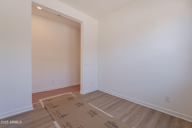 17966 W Long Lake Rd, Goodyear, AZ 85338 - spare room featuring light wood-style floors
