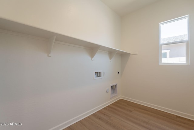 17966 W Long Lake Rd, Goodyear, AZ 85338 - laundry area with gas dryer hookup, light wood-style floors, hookup for an electric dryer, and hookup for a washing machine