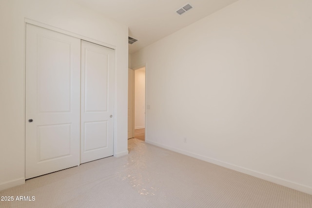 17966 W Long Lake Rd, Goodyear, AZ 85338 - unfurnished bedroom with carpet flooring and a closet