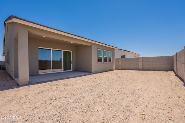 17966 W Long Lake Rd, Goodyear, AZ 85338 - rear view of property with stucco siding, a patio, and a fenced backyard
