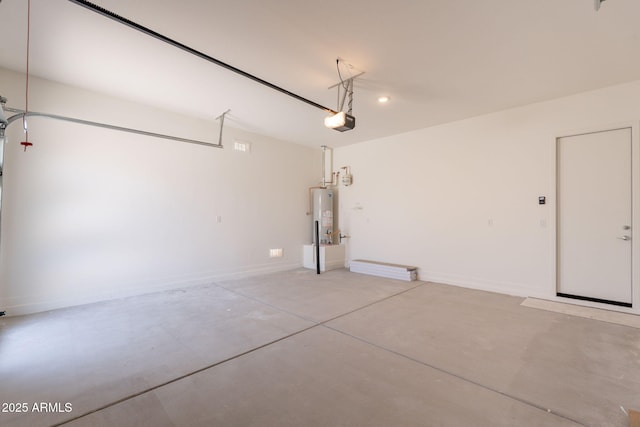 17966 W Long Lake Rd, Goodyear, AZ 85338 - garage with a garage door opener and gas water heater