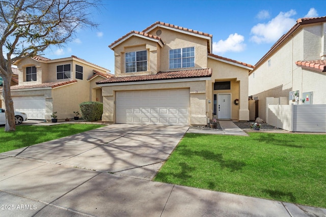 mediterranean / spanish home with a garage and a front yard