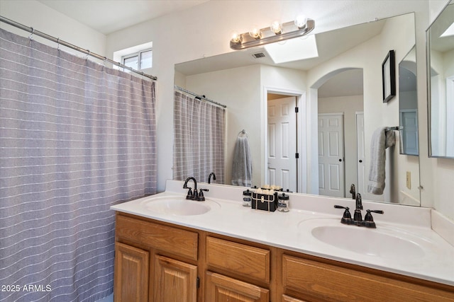 bathroom featuring vanity