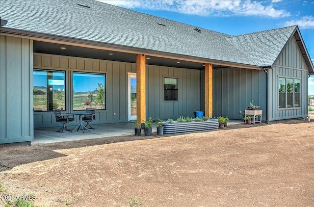 rear view of house featuring a patio area