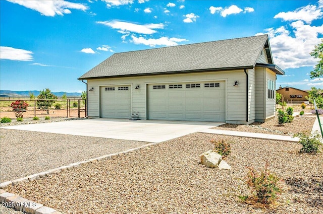 garage featuring a mountain view