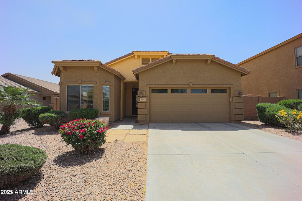 view of front of property featuring a garage