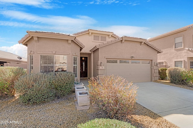 view of front of home with a garage