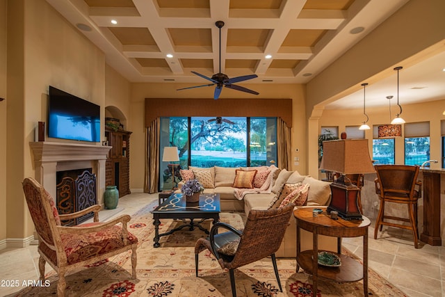 9905 N 78th Pl, Scottsdale, AZ 85258 - living area featuring beamed ceiling, ceiling fan, coffered ceiling, and a towering ceiling