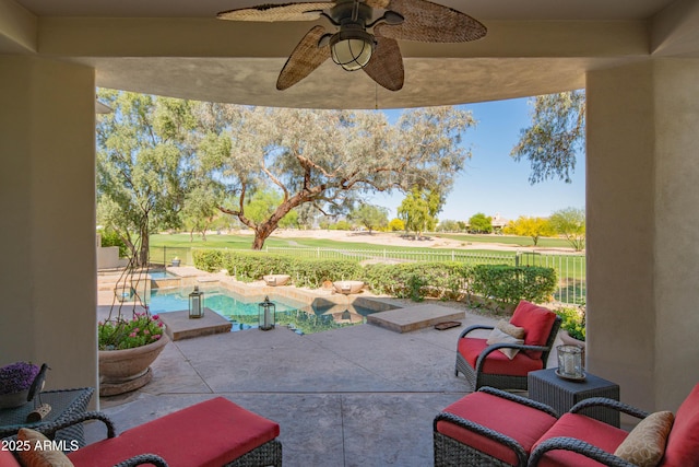 9905 N 78th Pl, Scottsdale, AZ 85258 - view of patio / terrace with fence, golf course view, a fenced in pool, and a ceiling fan