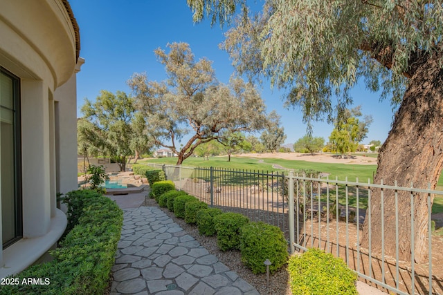 9905 N 78th Pl, Scottsdale, AZ 85258 - view of yard featuring view of golf course, a patio area, and fence