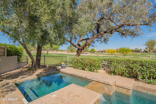 9905 N 78th Pl, Scottsdale, AZ 85258 - view of swimming pool with golf course view, a patio, and a fenced backyard