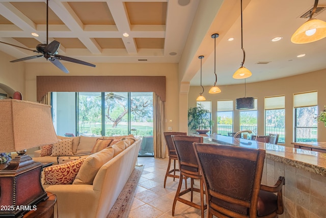 9905 N 78th Pl, Scottsdale, AZ 85258 - dining space featuring visible vents, ceiling fan, recessed lighting, stone tile floors, and coffered ceiling