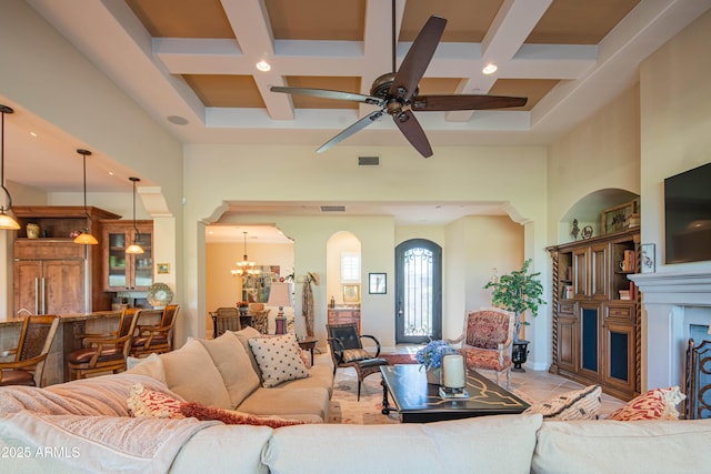 9905 N 78th Pl, Scottsdale, AZ 85258 - living area featuring coffered ceiling, arched walkways, a towering ceiling, and visible vents