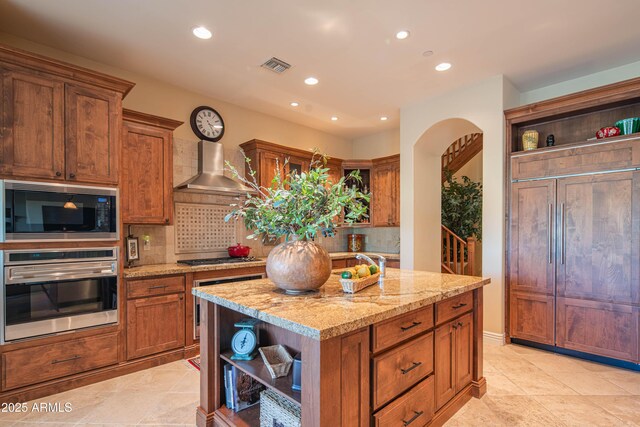 9905 N 78th Pl, Scottsdale, AZ 85258 - kitchen with built in appliances, recessed lighting, open shelves, visible vents, and wall chimney exhaust hood