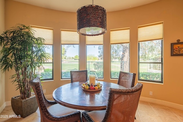 9905 N 78th Pl, Scottsdale, AZ 85258 - dining space with light tile patterned floors and baseboards