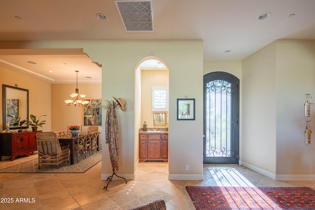 9905 N 78th Pl, Scottsdale, AZ 85258 - entryway featuring visible vents, baseboards, arched walkways, a notable chandelier, and recessed lighting