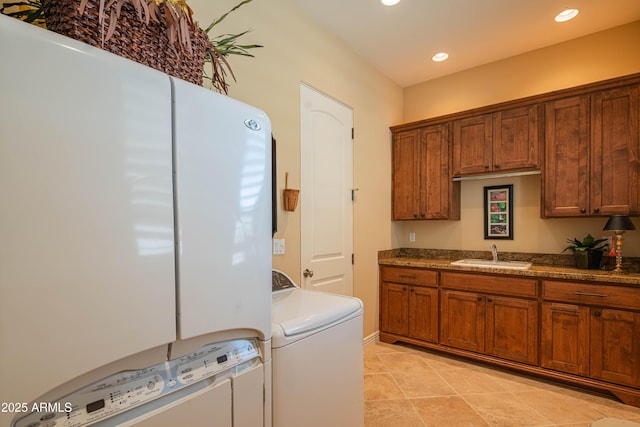 9905 N 78th Pl, Scottsdale, AZ 85258 - laundry room with light tile patterned floors, recessed lighting, a sink, cabinet space, and washer and clothes dryer