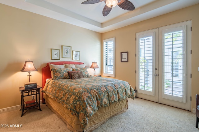 9905 N 78th Pl, Scottsdale, AZ 85258 - bedroom with access to outside, baseboards, light carpet, french doors, and a raised ceiling