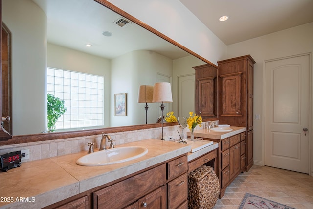 9905 N 78th Pl, Scottsdale, AZ 85258 - full bathroom with vanity, tile patterned flooring, visible vents, recessed lighting, and backsplash