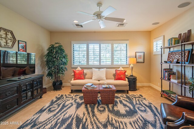 9905 N 78th Pl, Scottsdale, AZ 85258 - living room featuring visible vents, ceiling fan, and carpet
