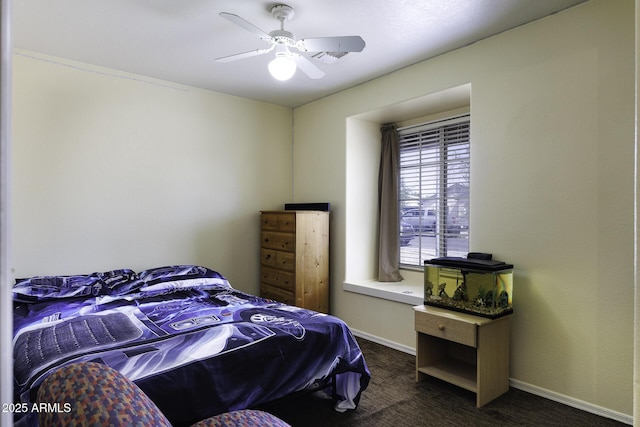 1623 E Krystal St, Casa Grande, AZ 85122 - bedroom with baseboards, a ceiling fan, and dark colored carpet