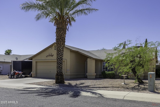 1623 E Krystal St, Casa Grande, AZ 85122 - ranch-style house featuring an attached garage, stucco siding, and driveway