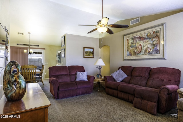 1623 E Krystal St, Casa Grande, AZ 85122 - carpeted living room with arched walkways, a ceiling fan, and visible vents