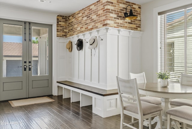 mudroom with french doors, dark wood-type flooring, and plenty of natural light