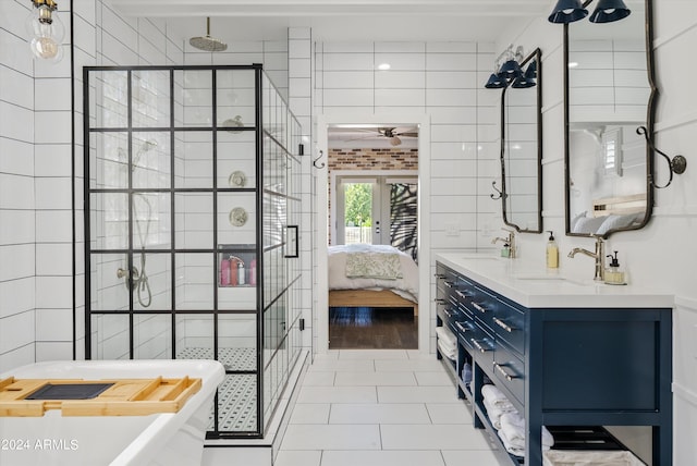 bathroom featuring vanity, ceiling fan, tile patterned floors, and a shower with shower door