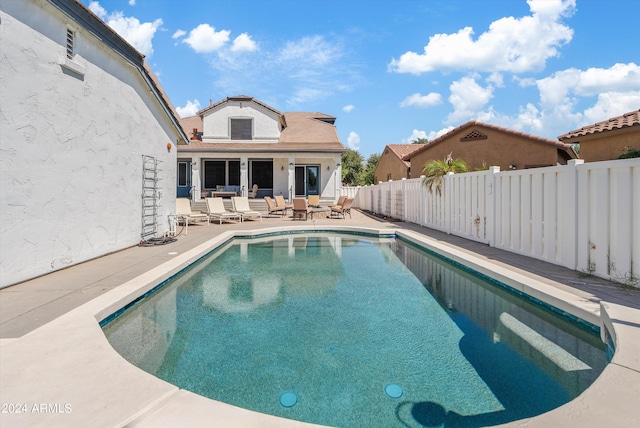 view of pool featuring a patio area