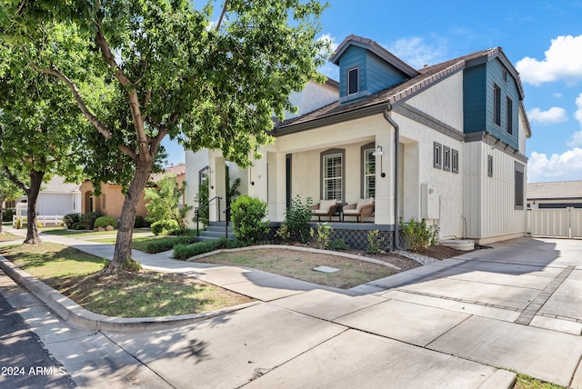 view of front of property featuring covered porch