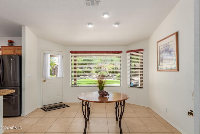 view of tiled dining area