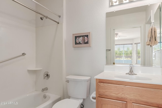 full bathroom with tub / shower combination, vanity, toilet, and ceiling fan