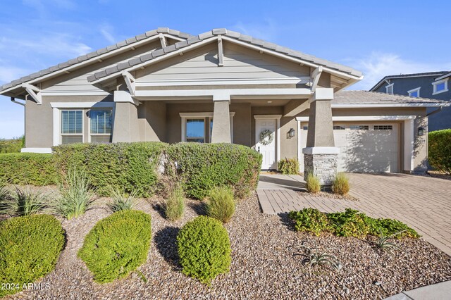 craftsman house with a garage